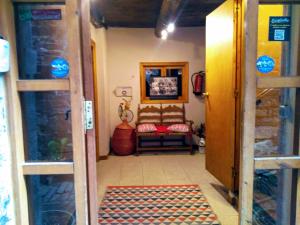 a room with a couch and a chair in it at Albergue Armaia Artepea in Urzainqui