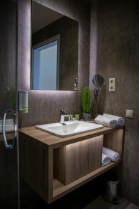 Koupelna v ubytování Lignum Hotel