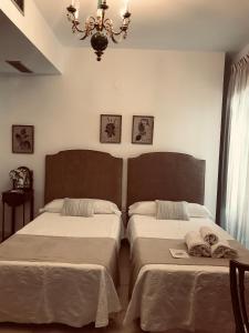 Postel nebo postele na pokoji v ubytování Casa longa
