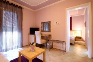 TV a/nebo společenská místnost v ubytování Hotel Aruba