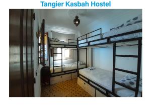 A bed or beds in a room at Tangier Kasbah Hostel