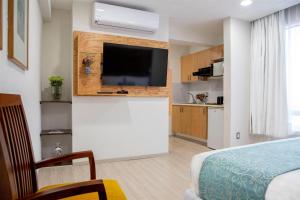 Köök või kööginurk majutusasutuses Suites Coben Apartamentos Amueblados