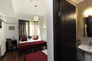 Ein Bett oder Betten in einem Zimmer der Unterkunft Tbilisi Check In