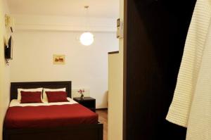 Ein Bett oder Betten in einem Zimmer der Unterkunft Tbilisi Check In