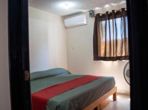 Voodi või voodid majutusasutuse Isabel Suites toas