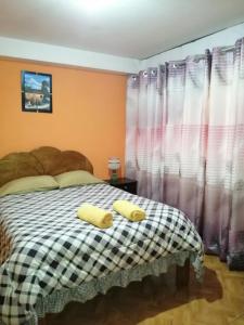 Postel nebo postele na pokoji v ubytování Sami House
