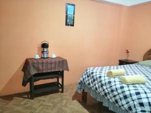 Postel nebo postele na pokoji v ubytování Sami House