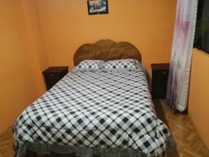 Postel nebo postele na pokoji v ubytování Sami House