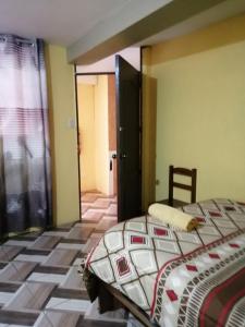 Postel nebo postele na pokoji v ubytování Sami House