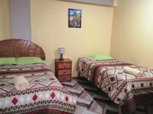 Postel nebo postele na pokoji v ubytování Sami House