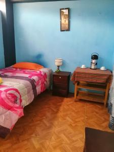 Postel nebo postele na pokoji v ubytování Sami House