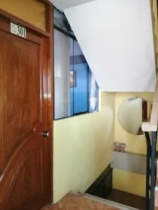 Postel nebo postele na pokoji v ubytování Sami House