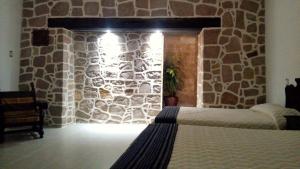 Voodi või voodid majutusasutuse Casa de Cactus toas