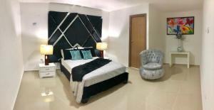 Ein Bett oder Betten in einem Zimmer der Unterkunft Hotel Platinum Barranquilla