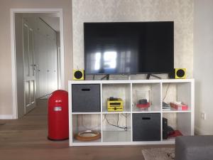 TV a/nebo společenská místnost v ubytování FeWo Trier