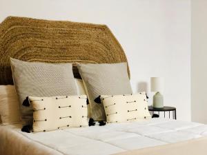 Giường trong phòng chung tại Canaryislandshost l Surf Lanzarote
