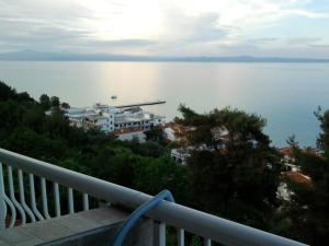 a view of the water from a balcony at Drenos Rooms view in Kallithea Halkidikis