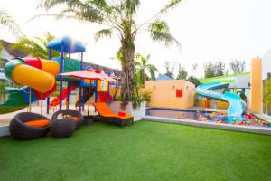 a childrens playground with a slide and a water park at FuramaXclusive Sandara Hua Hin at Cha-am Beach in Cha Am
