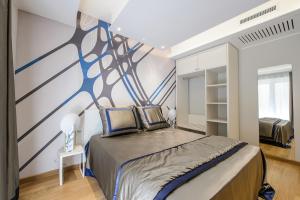 Postel nebo postele na pokoji v ubytování Quarto Novo Suite