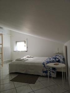 Postel nebo postele na pokoji v ubytování Sul Confine