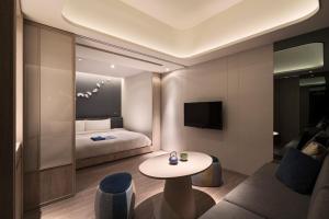 Letto o letti in una camera di 礁溪晶泉丰旅 Wellspring by Silks Jiaoxi