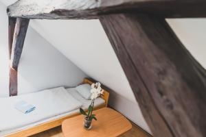 Postel nebo postele na pokoji v ubytování Zajazd Pod Lipami