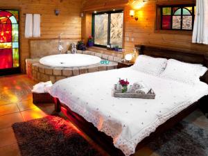 Postel nebo postele na pokoji v ubytování First Light Cabins + 37 fotografií
