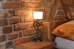 Postel nebo postele na pokoji v ubytování Apartmán u Brány