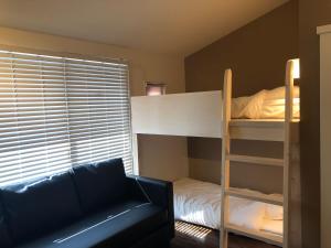 Condominium MIRAHAKONE客房内的一张或多张床位
