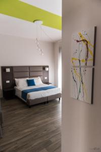 Posteľ alebo postele v izbe v ubytovaní Residenza del Borgo