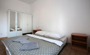 Posteľ alebo postele v izbe v ubytovaní Penzion - Apartments Pod Javořicí