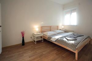 Postel nebo postele na pokoji v ubytování Penzion - Apartments Pod Javořicí