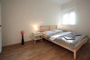 Posteľ alebo postele v izbe v ubytovaní Penzion - Apartments Pod Javořicí