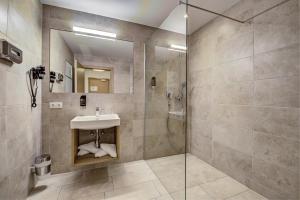 Koupelna v ubytování KOSIS Sports Lifestyle Hotel