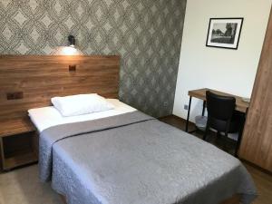 Postel nebo postele na pokoji v ubytování Hotell Wesenbergh