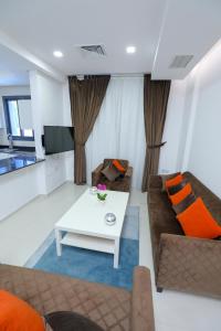 A seating area at ماجيك سويت بوليفارد Magic Suite Boulevard