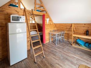 Kuchyň nebo kuchyňský kout v ubytování Camping L'Orangeraie