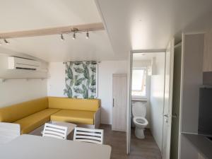 Posezení v ubytování Camping L'Orangeraie
