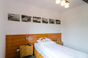 Postel nebo postele na pokoji v ubytování Stara Piekarnia