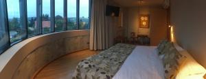 Postel nebo postele na pokoji v ubytování Hotel Amun