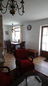 A seating area at Öregporta Vendégház