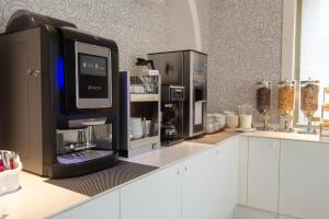 Kuchyňa alebo kuchynka v ubytovaní Hotel Vittoria