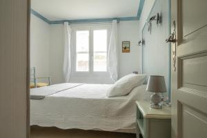 Postel nebo postele na pokoji v ubytování Maillane
