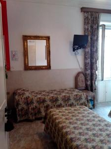 Cama o camas de una habitación en Hotel Stadler 2