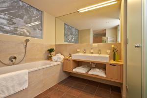 Kúpeľňa v ubytovaní Alpeiner - Nature Resort Tirol