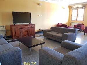 TV a/nebo společenská místnost v ubytování Hotel Meleiros