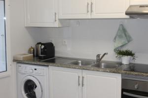 A cozinha ou cozinha compacta de Vigia's Guest House