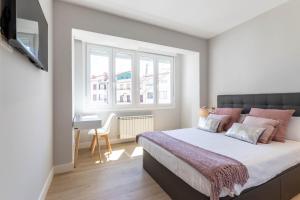 Katil atau katil-katil dalam bilik di Gernika by Aston Rentals +21 gambar