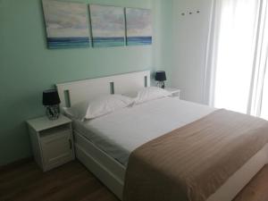 Кровать или кровати в номере CASA DE MAR