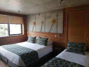 Postel nebo postele na pokoji v ubytování Hotel Amun